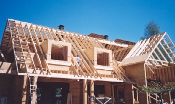 Noord-Amerikaanse architectuur en levering van alle soorten houtbouwsystemen en materialen